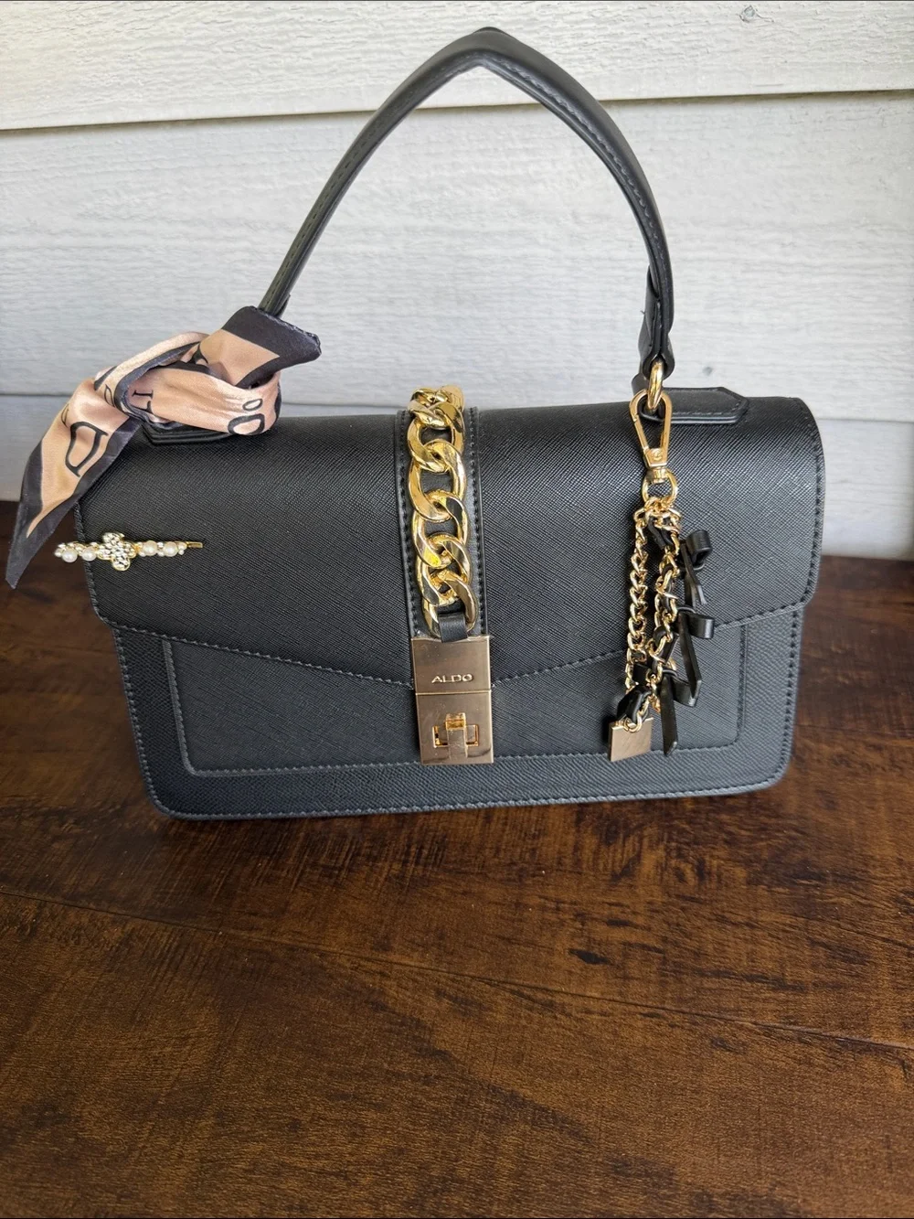 ALDO Black Satchel with Gold Chain and Charm Detail